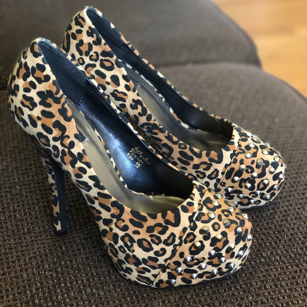 Yoki leopard platform heels with spikes.
